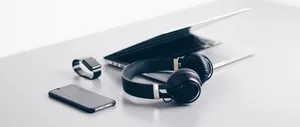 Enhancing Your Laptop Audio With Headphones Wallpaper