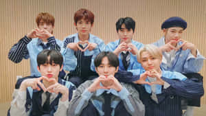 Enhypen Stays Connected With Their Laptop Wallpaper