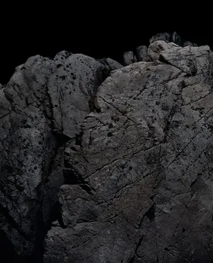 Enigmatic Dark Rock Formation Wallpaper