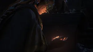 Enigmatic Fire Keeper In A Dark Fantasy World Wallpaper