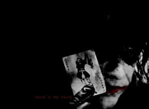 Enigmatic Joker Card In Vibrant Colors Wallpaper