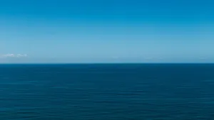 Enjoy A Breathtaking View Of The Sky - Blue Horizon Wallpaper