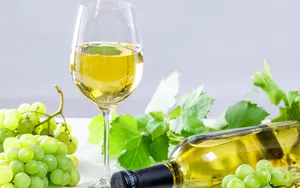 Enjoy A Chilled Glass Of White Wine In The Warm Summer Sun. Wallpaper