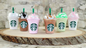 Enjoy A Cup Of Coffee From Aesthetic Starbucks Wallpaper