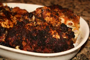 Enjoy A Delectable Meal Of Blackened Chicken Wallpaper