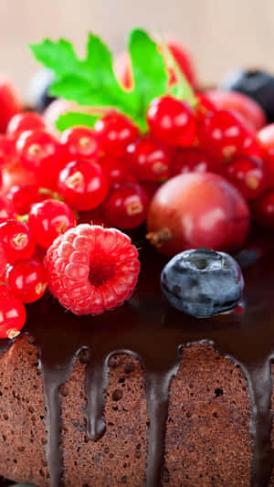 Enjoy A Delectable Piece Of Dessert On Your Iphone Wallpaper