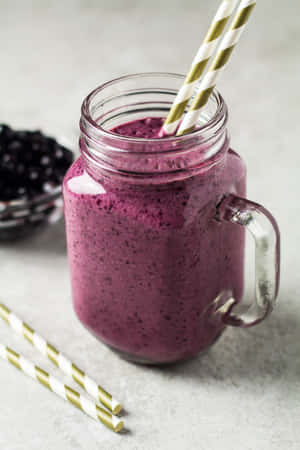 Enjoy A Delicious And Nutritious Blueberry Smoothie At Home! Wallpaper