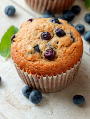 Enjoy A Delicious Blueberry Muffin Wallpaper