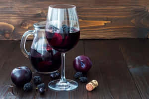 Enjoy A Delicious Glass Of Blackberry Wine Wallpaper