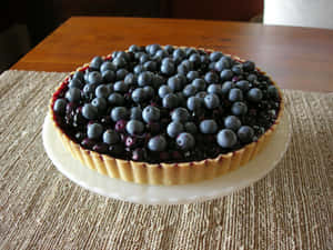 Enjoy A Deliciously Sweet Blueberry Tart Wallpaper