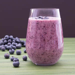 Enjoy A Fresh Blueberry Smoothie Wallpaper