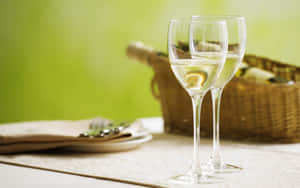 Enjoy A Glass Of Relaxing White Wine Wallpaper