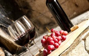 Enjoy A Glass Of Rich, Enchanting Black Wine. Wallpaper