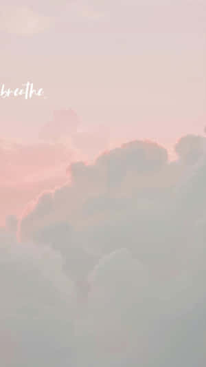 Enjoy A Peaceful And Dreamy Sky Moment With Angel Aesthetic Clouds Wallpaper