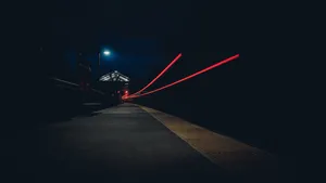 Enjoy A Relaxing Night Walk Through The Streets Of The City Wallpaper