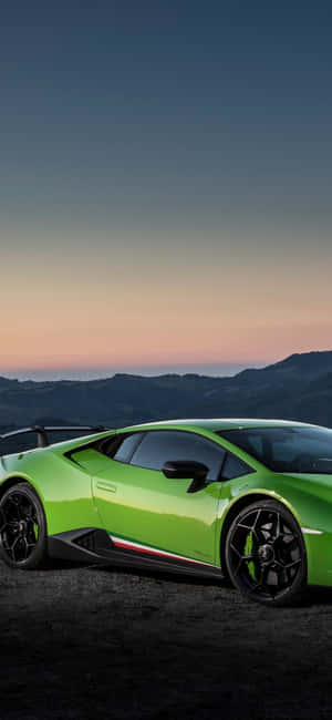 Enjoy A Ride In A Green Lamborghini Wallpaper