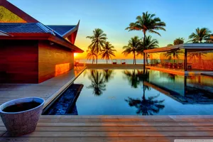 Enjoy A Scenic View From A Relaxing Pool House Wallpaper