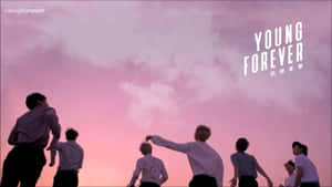 Enjoy A Seamless And Tranquil Desktop With These Soothing Bts Pink Aesthetic Wallpapers Wallpaper