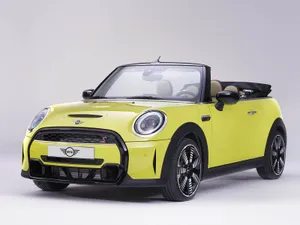 Enjoy An Open Sky Adventure With The Mini Cooper S Convertible Wallpaper