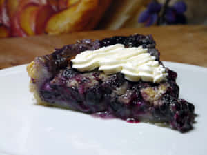 Enjoy Delicious Blueberries Tart Anytime Wallpaper