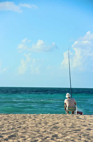 Enjoy Fishing While Talking On The Phone Wallpaper