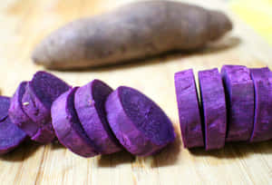 Enjoy Fresh, Local Potatoes Of Rich Purple Color Wallpaper