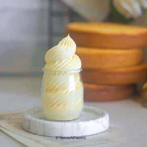 Enjoy Spoonfuls Of Delicious Buttercream! Wallpaper