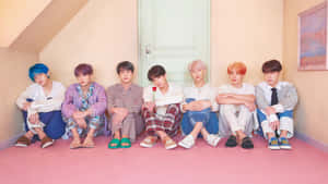 Enjoy The Aesthetic Perfection Of Bts With This Pink Desktop Wallpaper Wallpaper