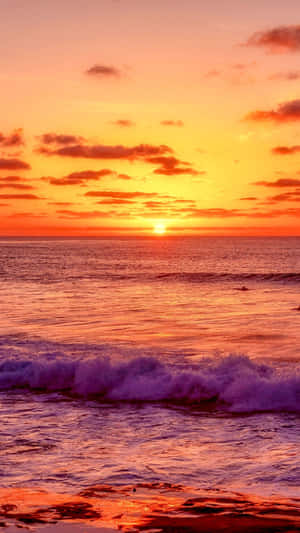 Enjoy The Beautiful Colors Of A Sunrise. Wallpaper