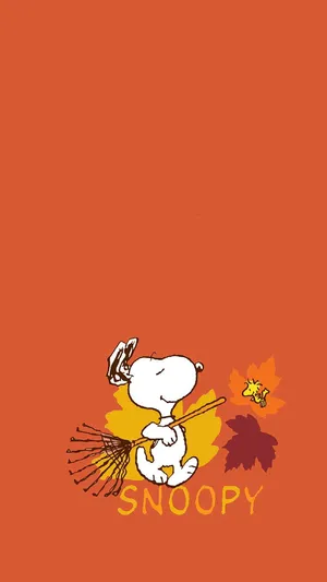 Enjoy The Beautiful Fall Leaves With Snoopy Wallpaper