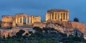 Enjoy The Beauty Of A Cloudy Sky Over The Hills Wallpaper