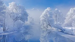 Enjoy The Beauty Of Snow-filled Landscapes With A Great Winter Laptop. Wallpaper