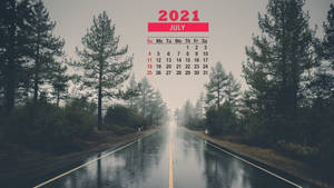 Enjoy The Change Of July With A Rainy Road Wallpaper