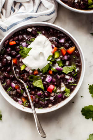 Enjoy The Deliciously Hearty Flavors Of Homemade Black Bean Soup. Wallpaper