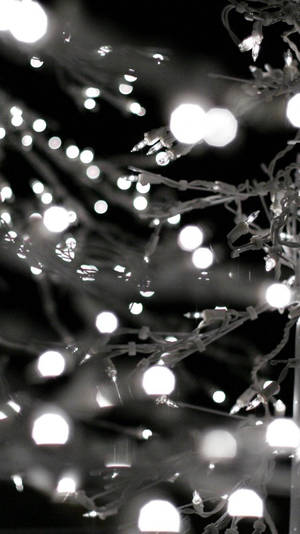 Enjoy The Festive Atmosphere Of Sparkling Christmas Lights! Wallpaper