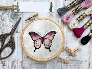 Enjoy The Intricate Beauty Of The Butterfly Stitch. Wallpaper