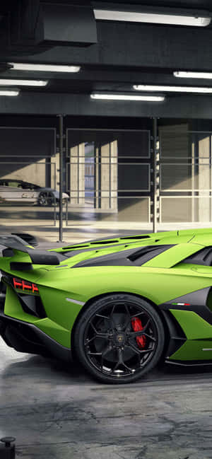 Enjoy The Luxuries Of Life In A Green Lamborghini. Wallpaper