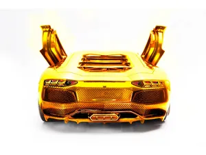 Enjoy The Luxury And Power Of A Gold Lamborghini Wallpaper