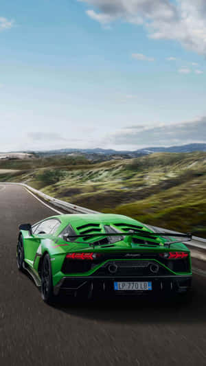 Enjoy The Luxury Of A Lamborghini In Green Wallpaper