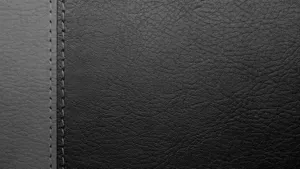 Enjoy The Luxury Of Black Leather. Wallpaper