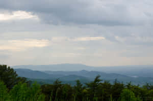 Enjoy The Majestic Beauty Of The Blue Ridge Mountains Wallpaper