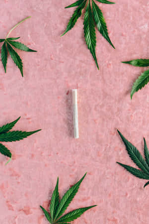 Enjoy The Moment And Relax With A Smooth Hit From This Hand-rolled Weed Blunt Wallpaper