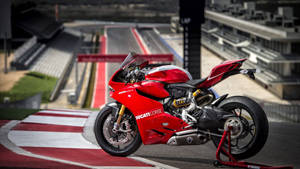 Enjoy The Performance Thrill With This Awaiting Parked Ducati 1199 Panigale R Wallpaper