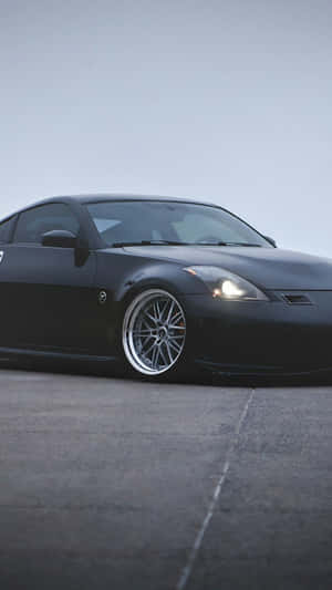 Enjoy The Ride With The Sleek And Stylish Nissan 350z Wallpaper