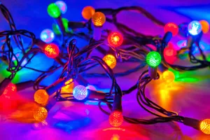 Enjoy The Sparkle Of Festive Christmas Lights Wallpaper