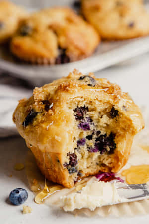 Enjoy The Sweet Aroma Of Freshly Baked Blueberry Muffins! Wallpaper