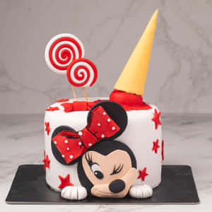 Enjoy The Sweetness Of A Delicious Cake Decorated With Fondant Wallpaper