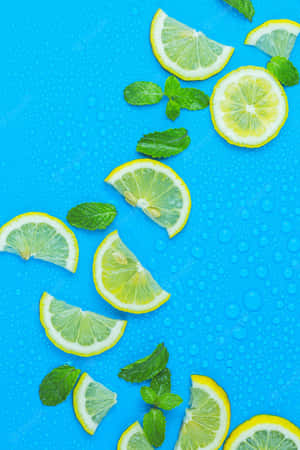 Enjoy The Tangy Taste Of Technology With Lemon's Iphone Wallpaper