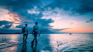 Enjoy The Tranquil Atmosphere Of Bass Fishing Wallpaper