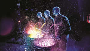 Enjoy The Uniques Entertainment Of Blue Man Group Wallpaper